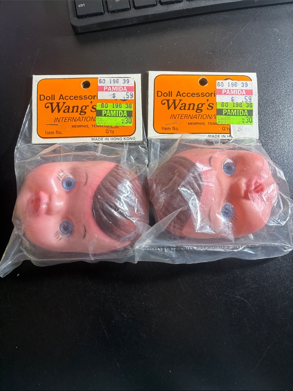 Wangs international baby doll head with hands and bottle